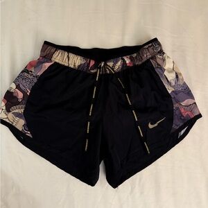 Nike Women's Black and Floral Print Athletic Shorts